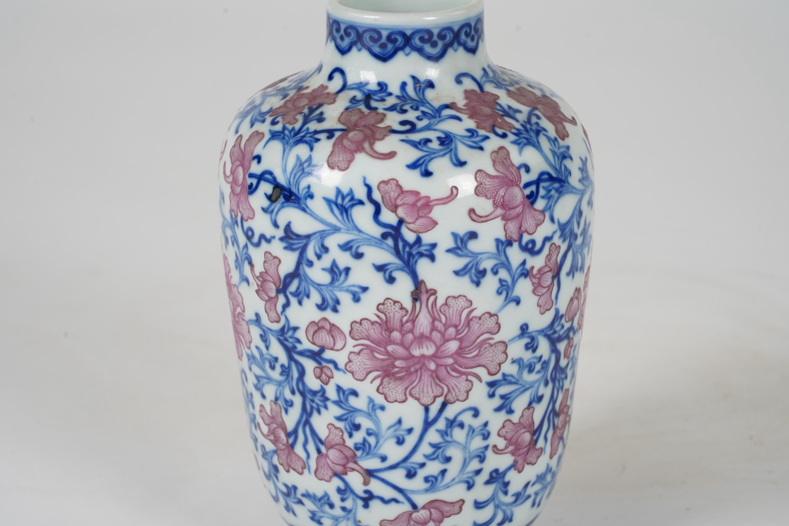 A Chinese pink enamelled and underglaze blue vase, six character Qianlong seal mark to base, possibly Republic period